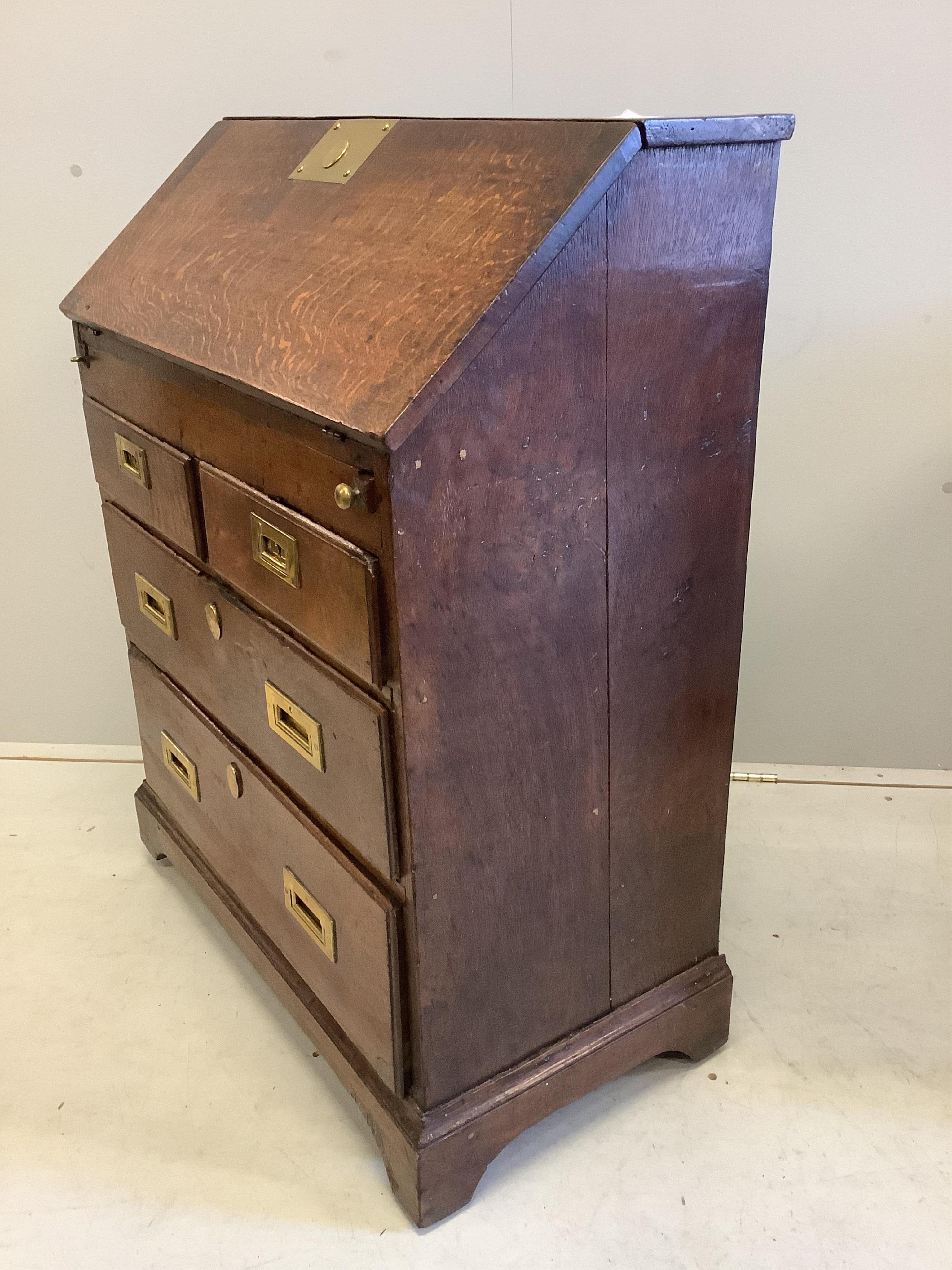 A small 18th century style brass mounted oak bureau, width 73cm, depth 40cm, height 94cm